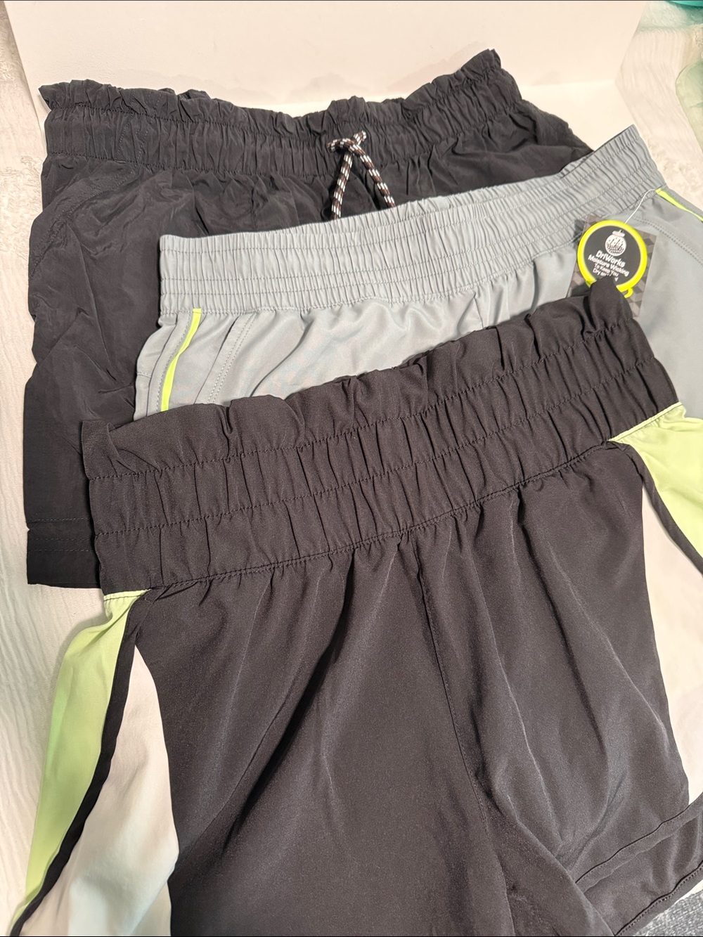 Avia Black Athletic Shorts with Subtle Gold Logo Accent